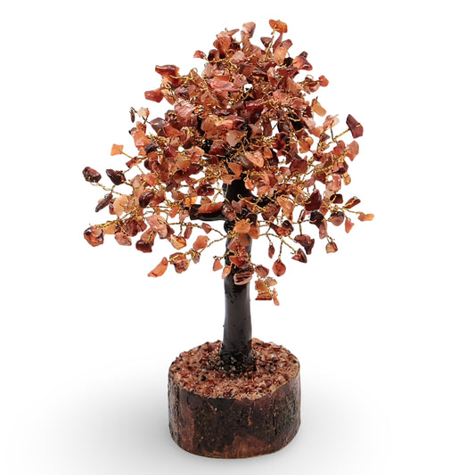 Decorative tree made of small stones on a white background